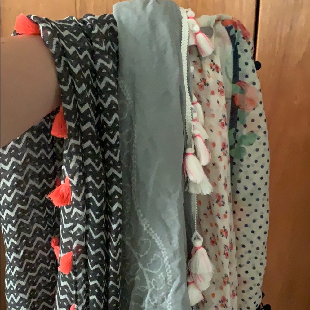 Bundle of three scarves.